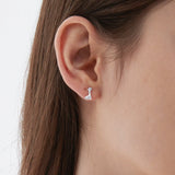 STMG Giraffe Stud Earrings on ear