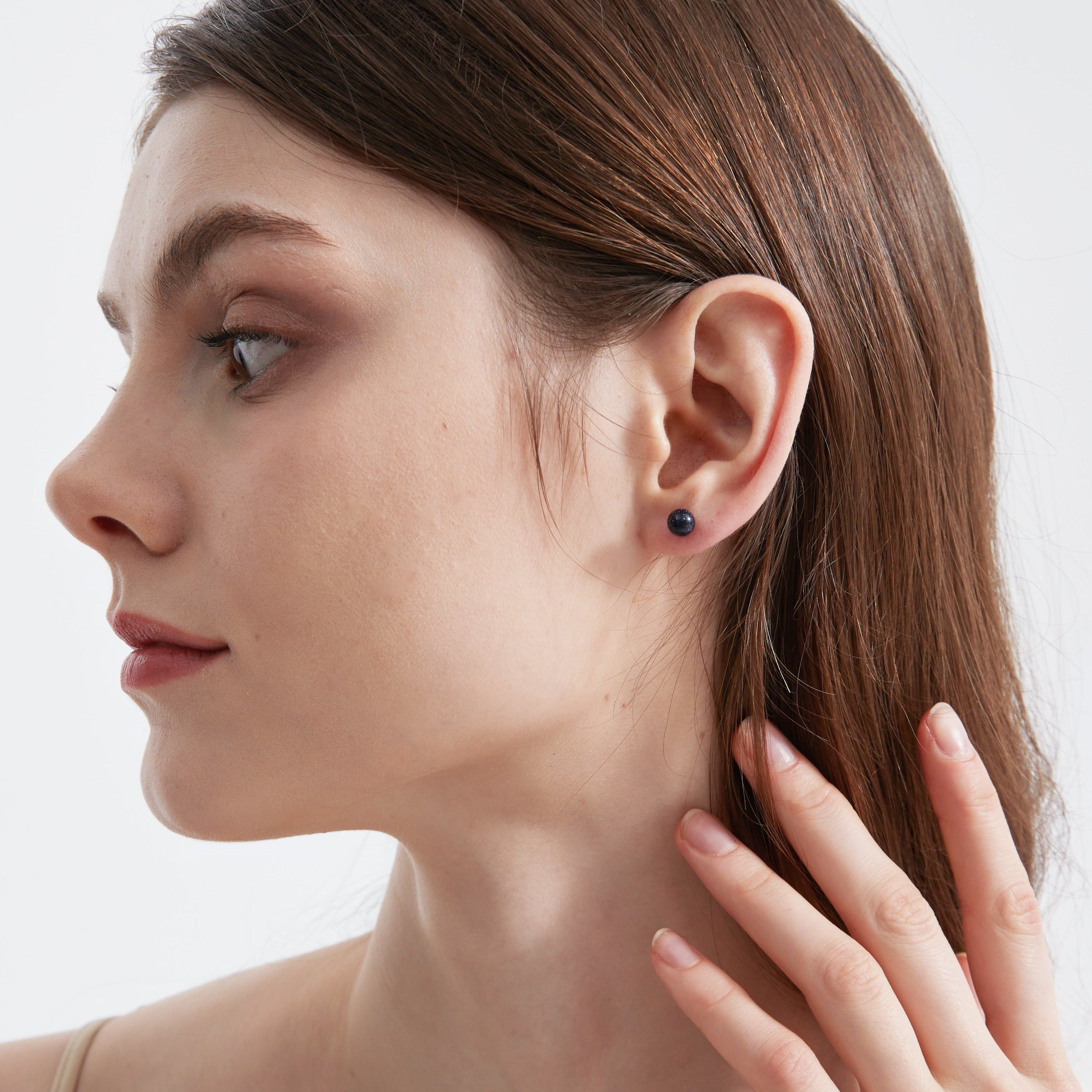 Blue Sandstone Stud Earrings on ear