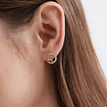 Crescent Moon Reindeer Stud Earrings on ear