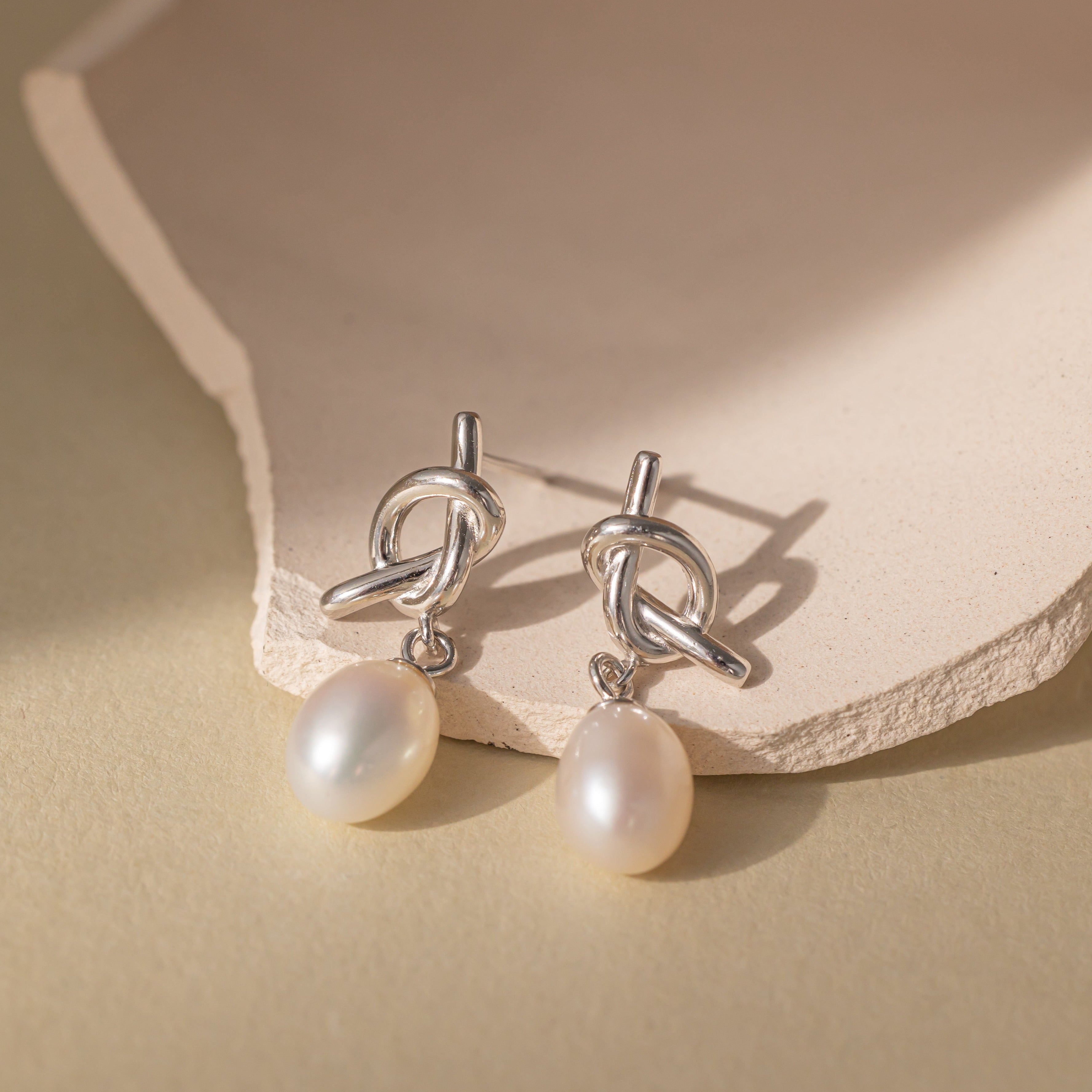 STMG Natural Pearl Knot Dangle Earrings in silver