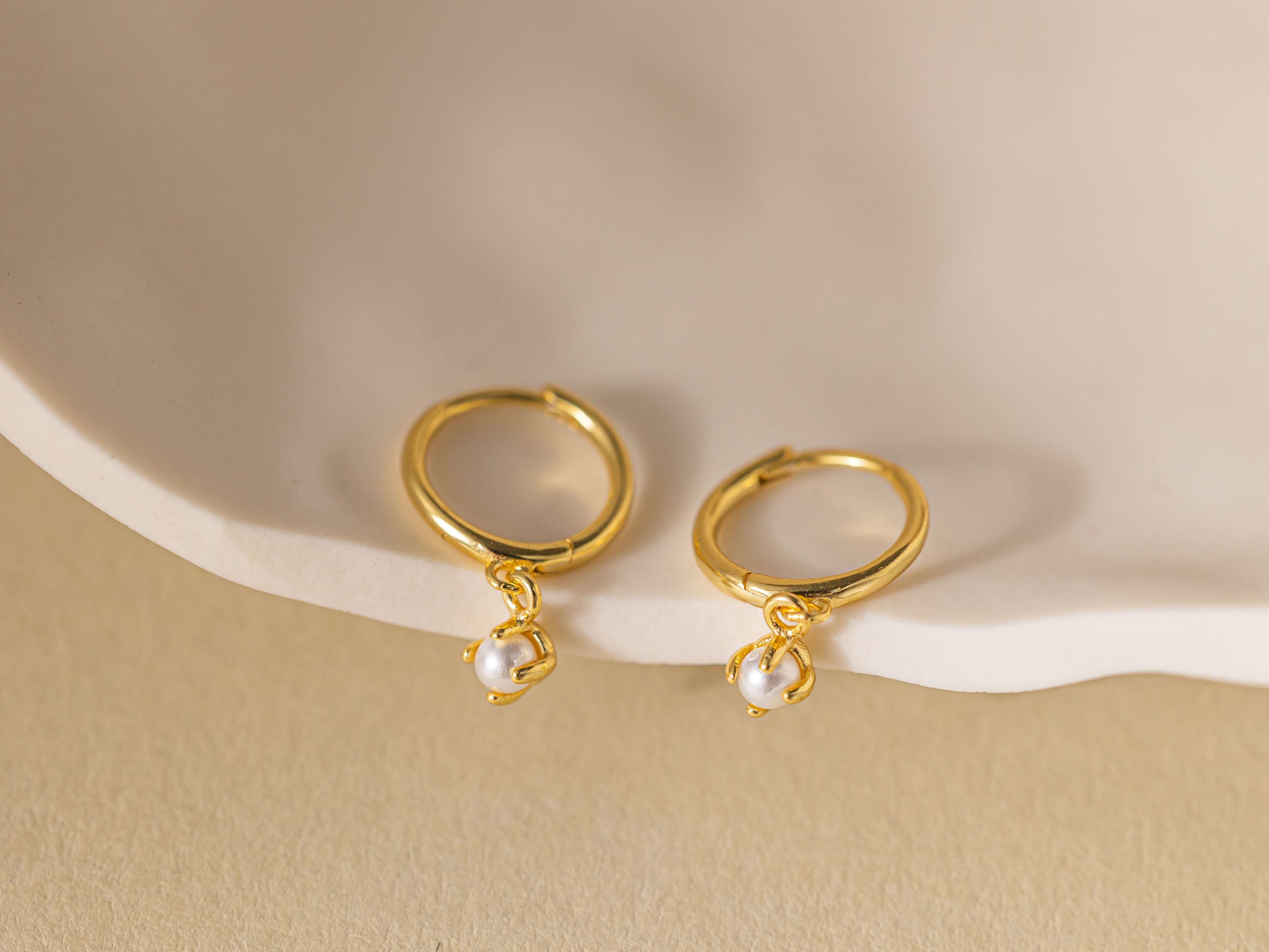 STMG Pearl Dangle Hoops in gold