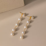 STMG Natural Pearl Dangle Earrings in gold