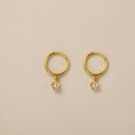 STMG Pearl Dangle Hoops in gold