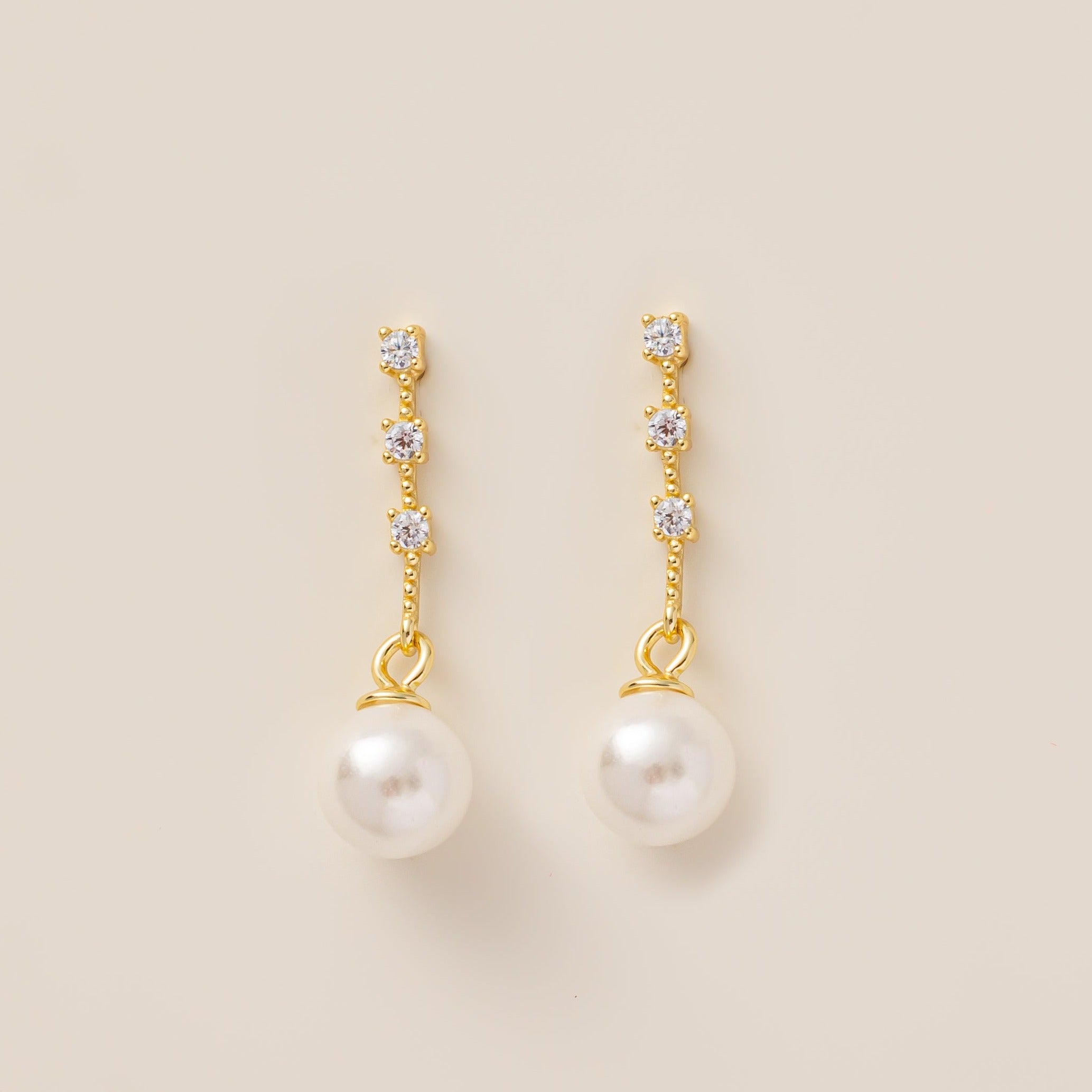 STMG Pearl Dangle Earrings in gold