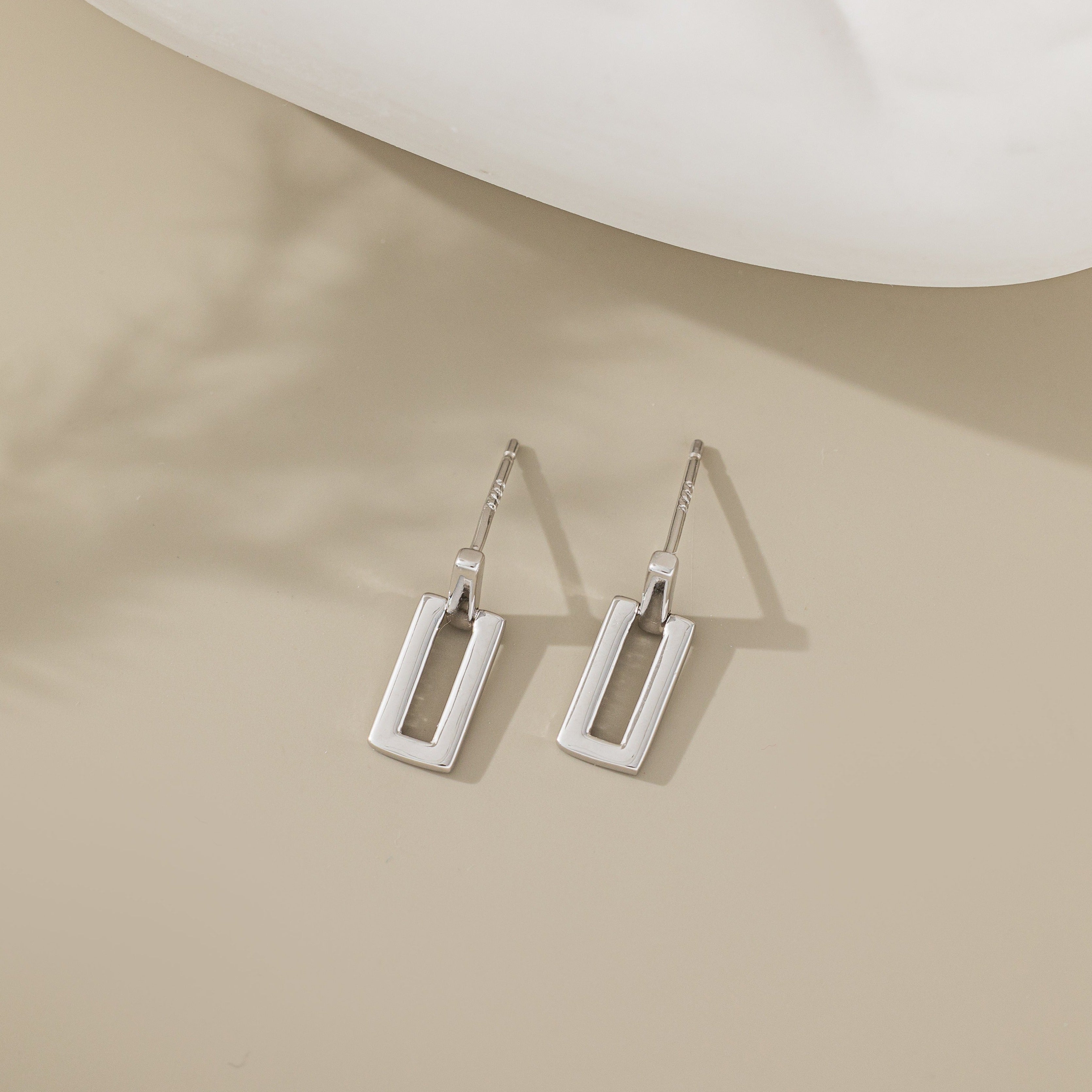 STMG Rectangle Dangle Earrings in silver