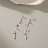 STMG Leaf Dangle Earrings in silver