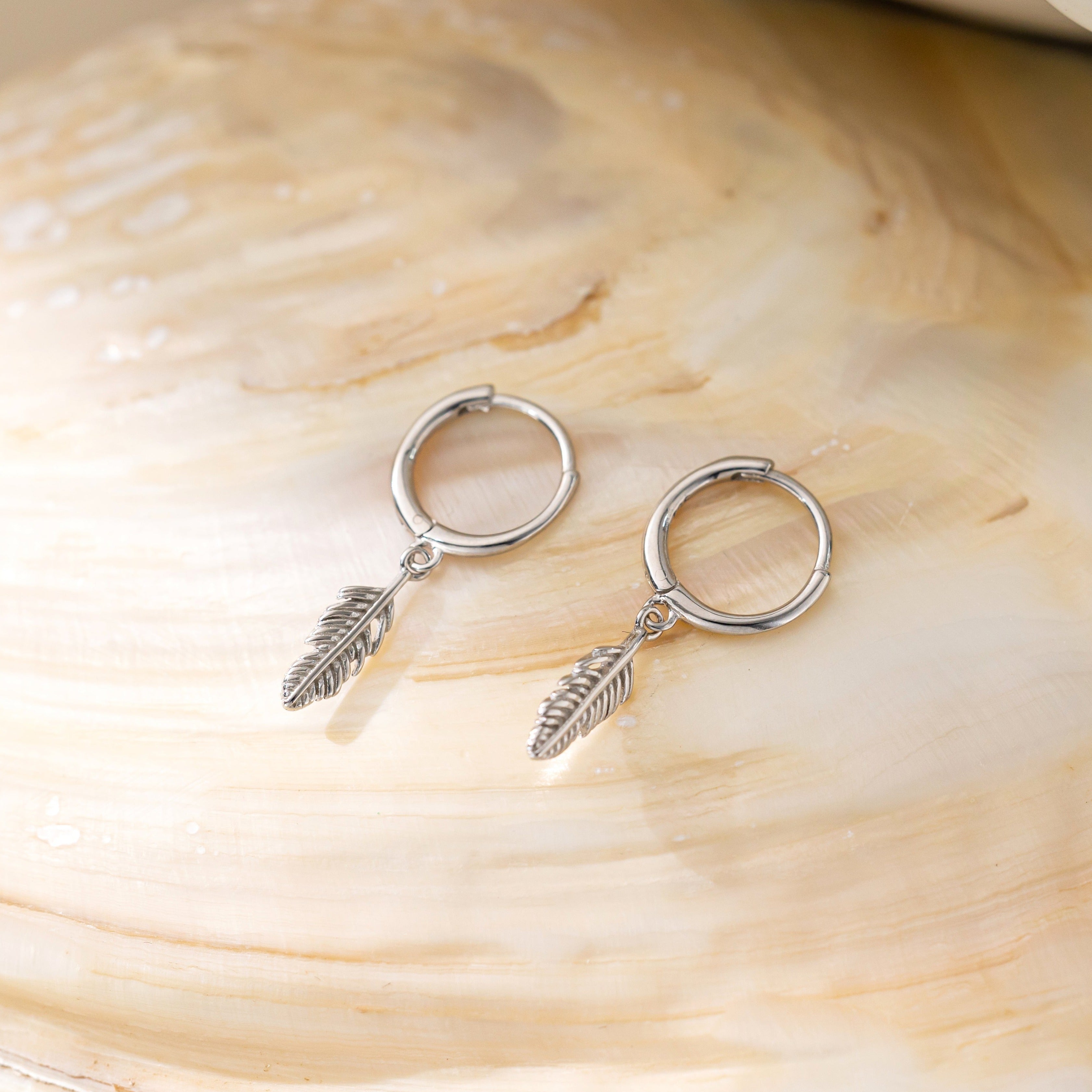 Feather Dangle Hoops in silver