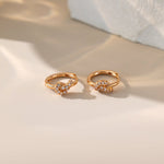 STMG Minimalist Knot Hoops in champagne gold