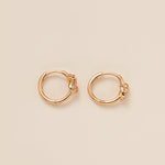 STMG Minimalist Knot Hoops in champagne gold