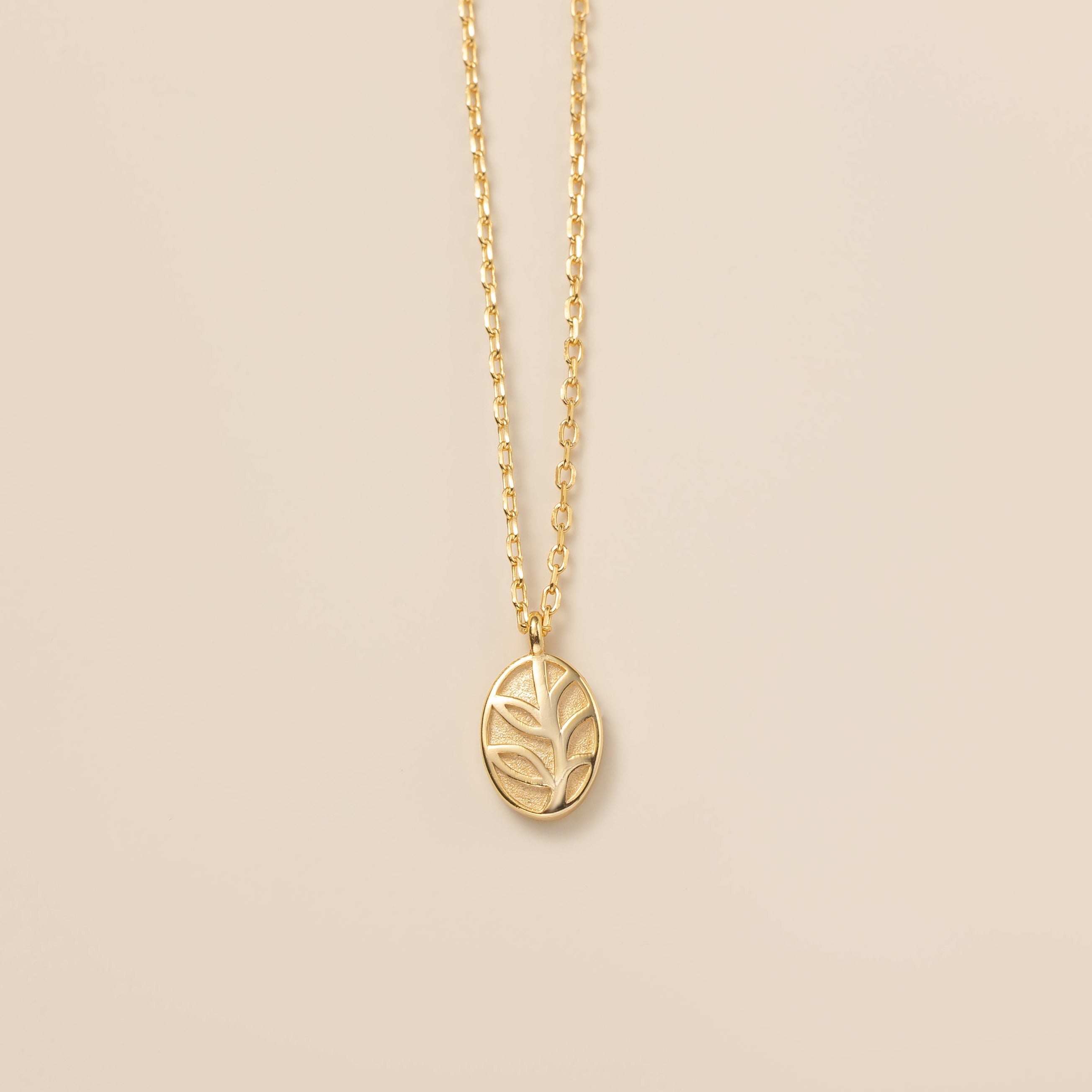 STMG Olive Leaf Oval Plate Necklace in gold