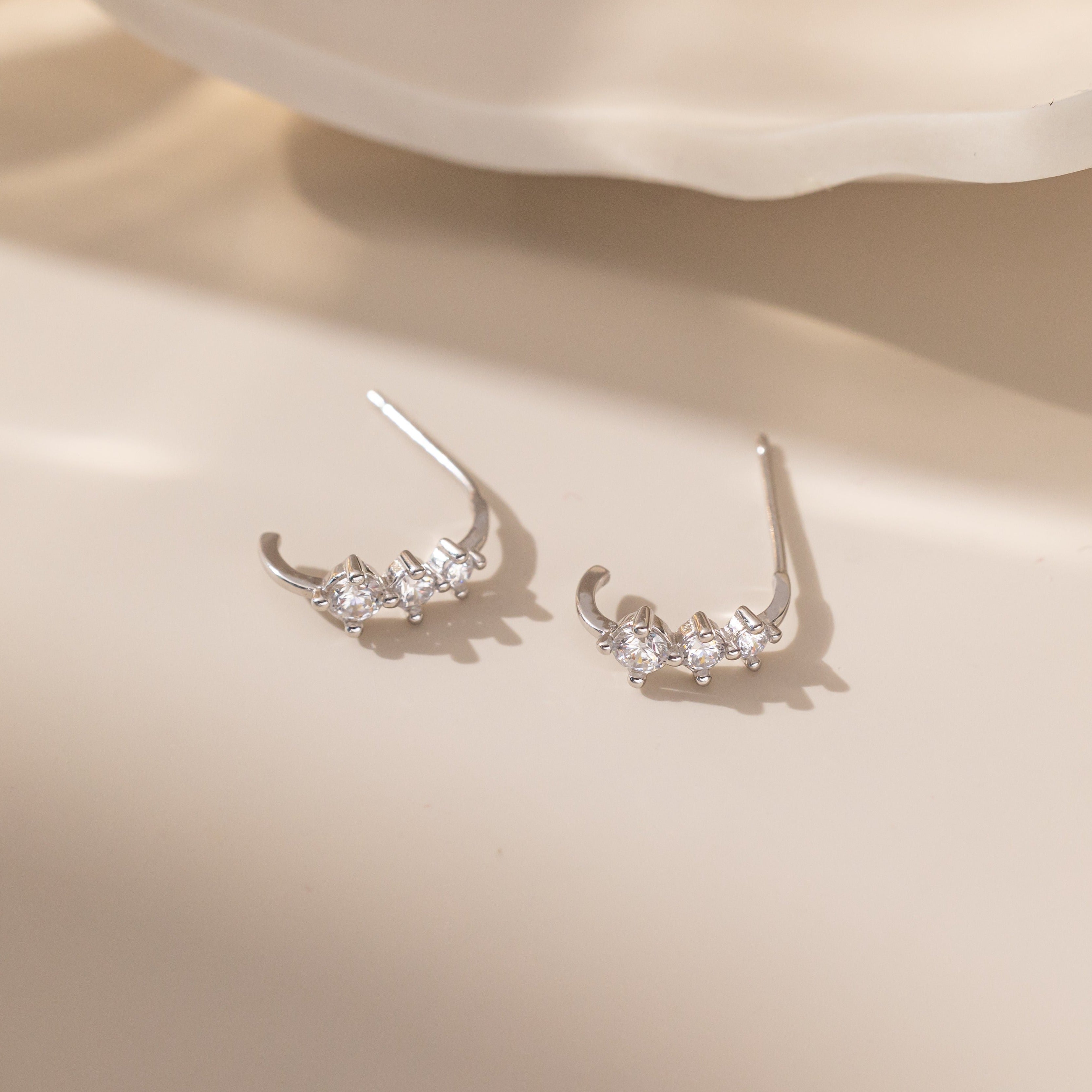 Curved Tiny Stud Earrings in silver