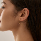 STMG Olive Leaf Adjustable Stud Earrings in gold on ear