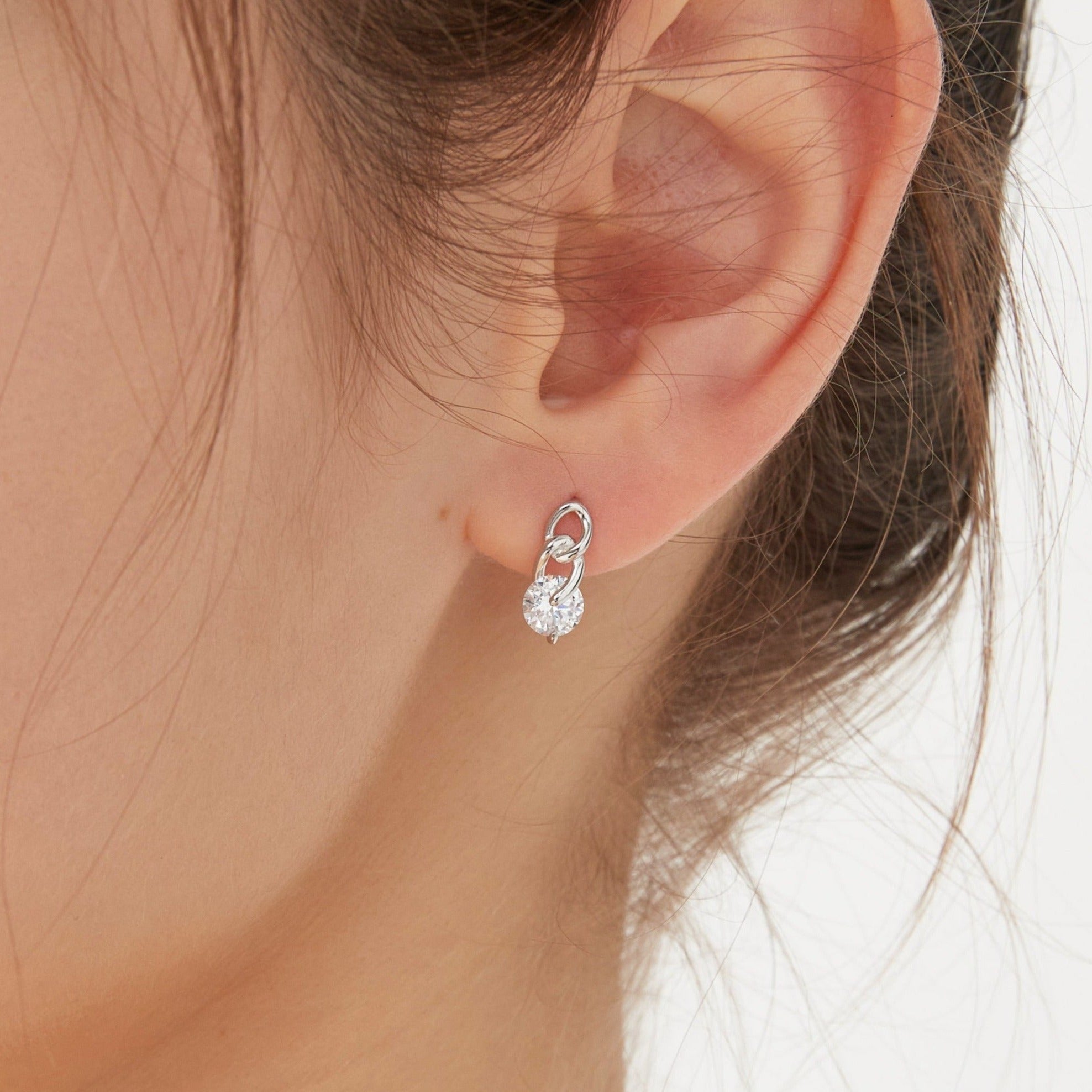 Diamond on Chain Hoops in silver on ear