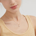 STMG Sunflower Necklace in gold on neck