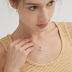 STMG Sunflower Necklace in gold on neck