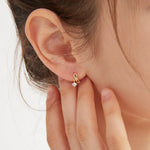 Bowknot Dangle Star Hoops in gold on ear