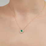 STMG Green Emerald Sun Disk Necklace on neck