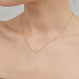 STMG Meteor Star Necklace on neck