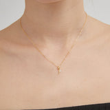 STMG Tiny Rose Necklace on neck