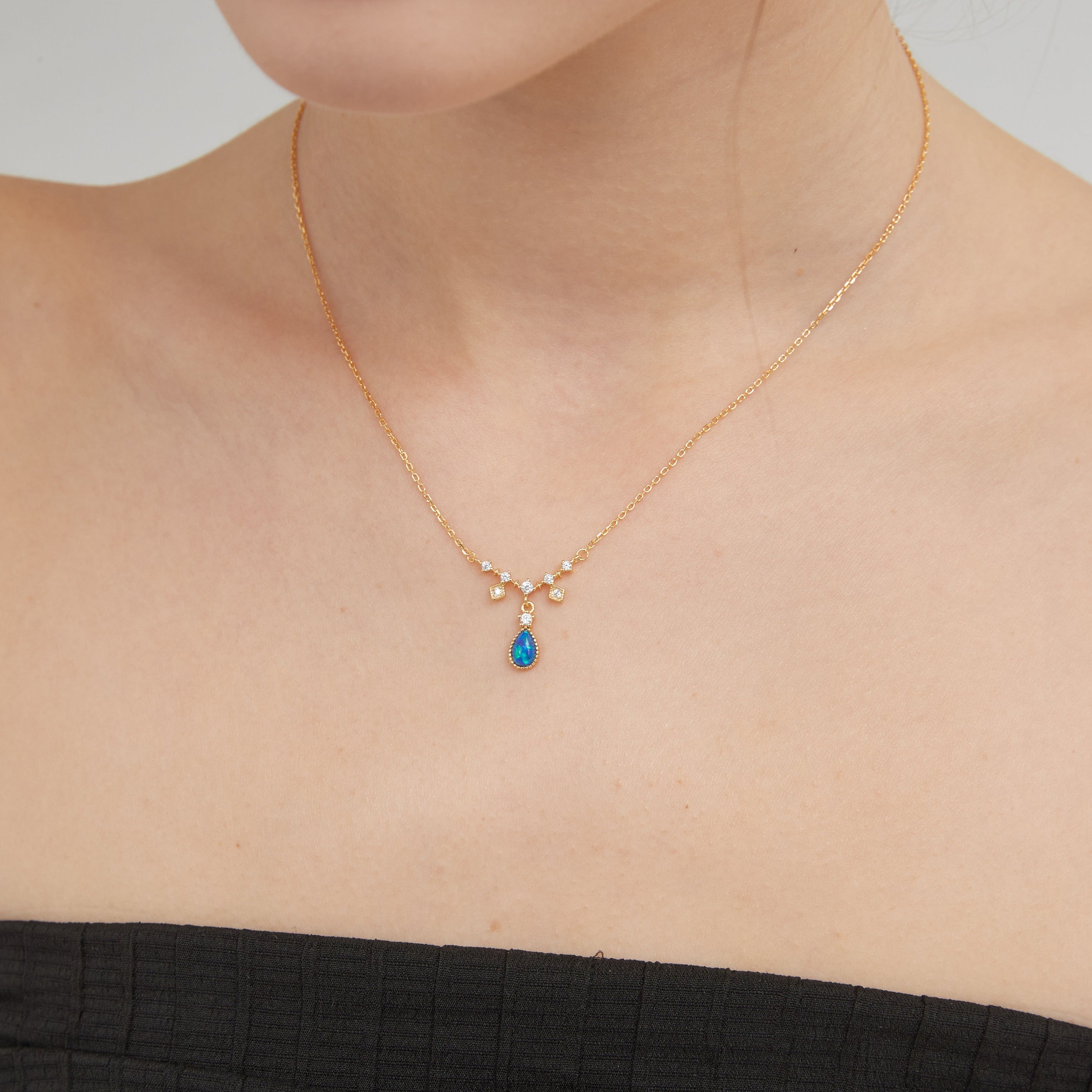 Blue Fire Opal Droplet Necklace on neck