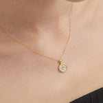 STMG Moonstone Snowflake Necklace on neck