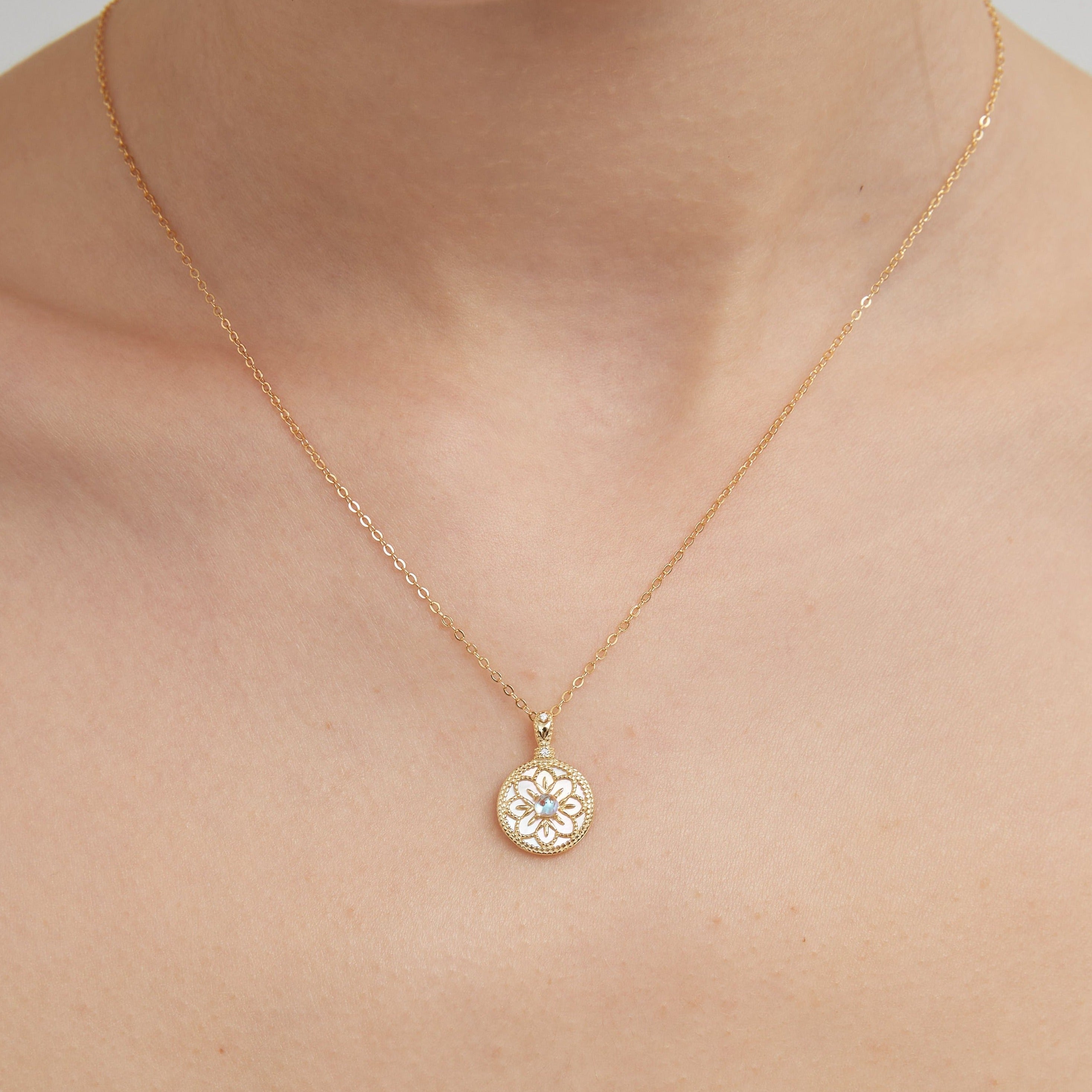 STMG Moonstone Snowflake Necklace on neck