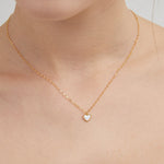 STMG Natural Mother of Pearl Heart Necklace on neck