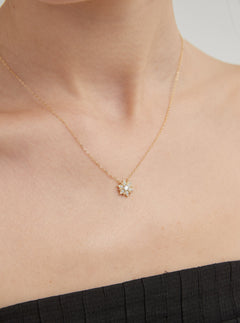 STMG Snowflake Necklace on neck