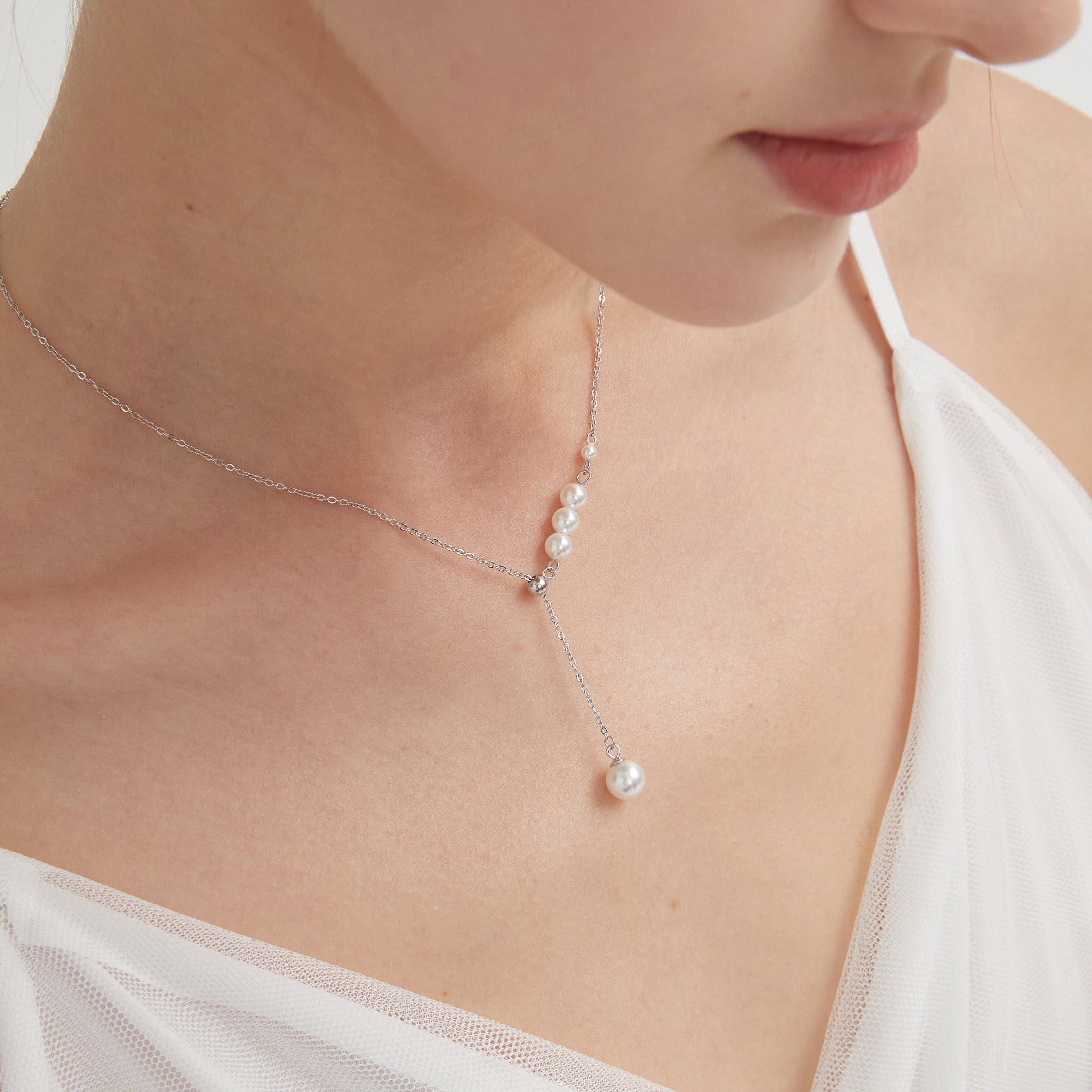 STMG Pearl Necklace in silver on neck