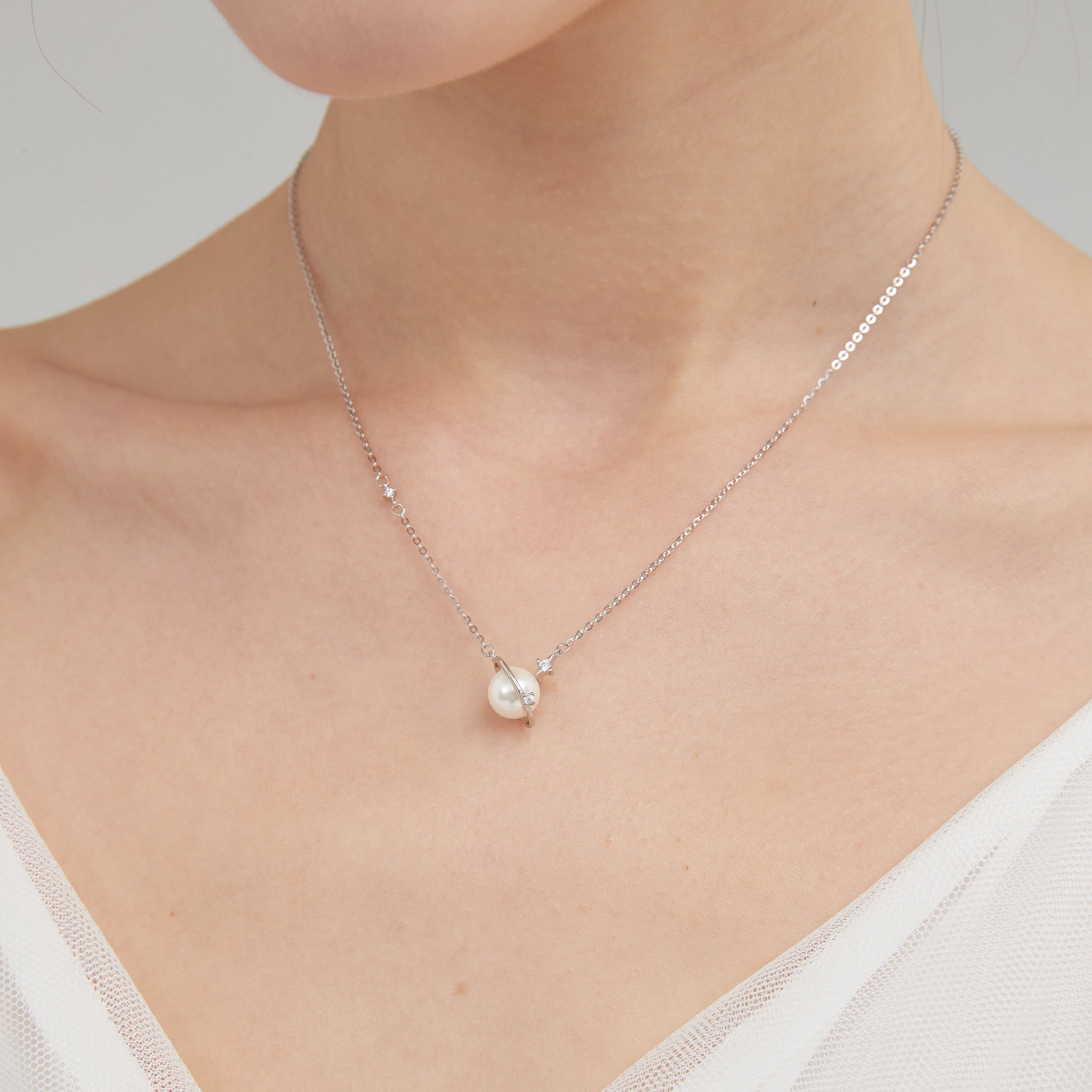 STMG Pearl Planet with CZ Stars Necklace in silver on neck