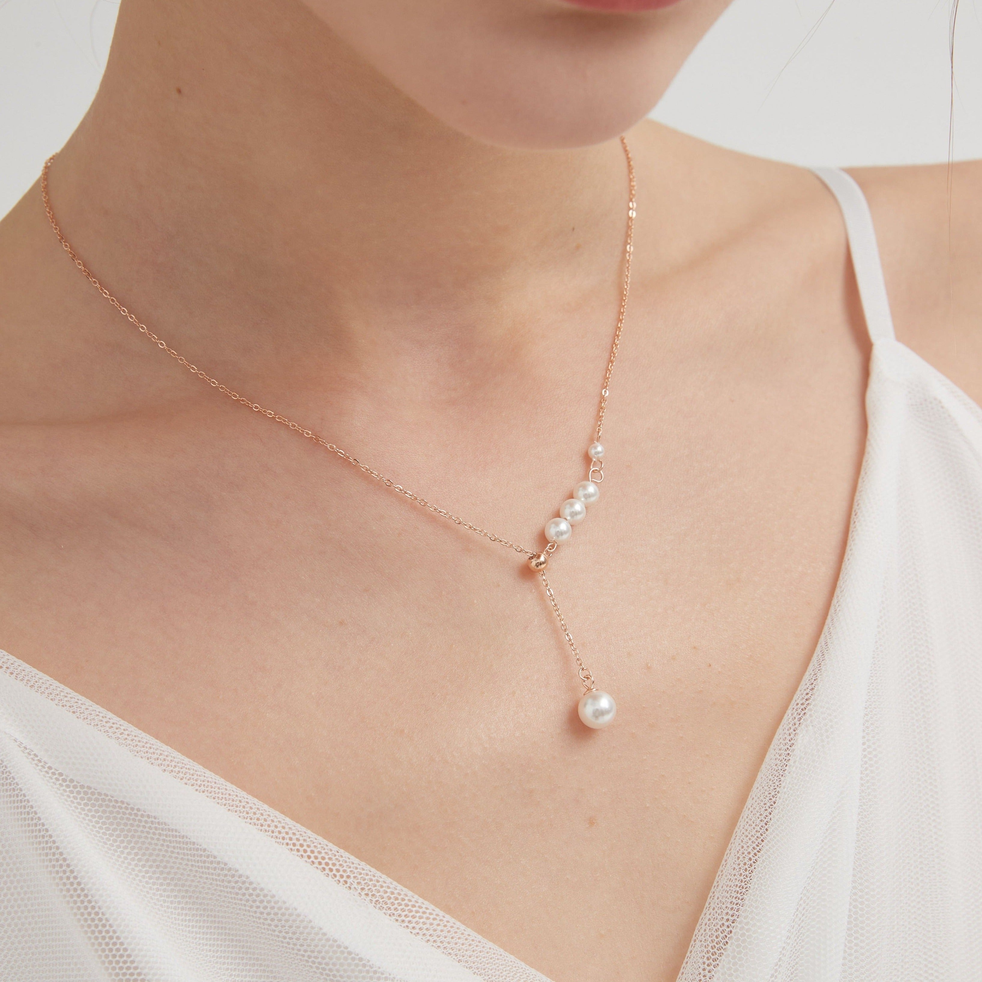 STMG Pearl Necklace on neck