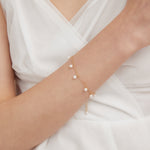 Beaded Pearl Minimalist Bracelet on hand