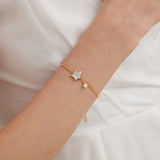 STMG Star with Pearl Bracelet on hand