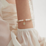 STMG Natural Pearl with Jade Bracelet on hand