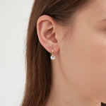 STMG Sparkly Crystal Hoops in gold on ear