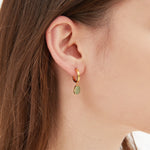 STMG Natural Aventurine Dangle Earrings in gold on ear