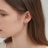 STMG Snake Hoops in silver on ear