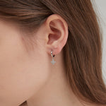 4-leaf Clover Flowers Hoops in silver on ear