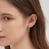 Duo-stars Stud Earrings in gold on ear