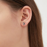 Black Crescent Moon Stud Earrings on ear