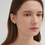 STMG Minimalist Diamond Stud Earrings in silver on ear