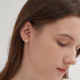 STMG Natural Pearl on Wreath Stud Earrings on ear