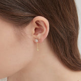 Bauhinia Dangle Earrings on ear