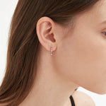 STMG Rhombus Droplet Hook Earrings in silver on ear