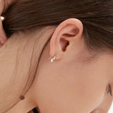 STMG Rhombus Droplet Hook Earrings in silver on ear