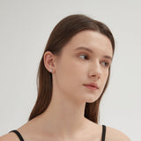 STMG Swan Stud Earrings on ear