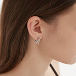 STMG Minimalist Butterfly Hoops on ear