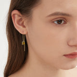 STMG Olive Green Dangle Threader Earrings on ear