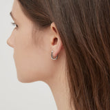 STMG Oval Rectangular Hoops in silver on ear