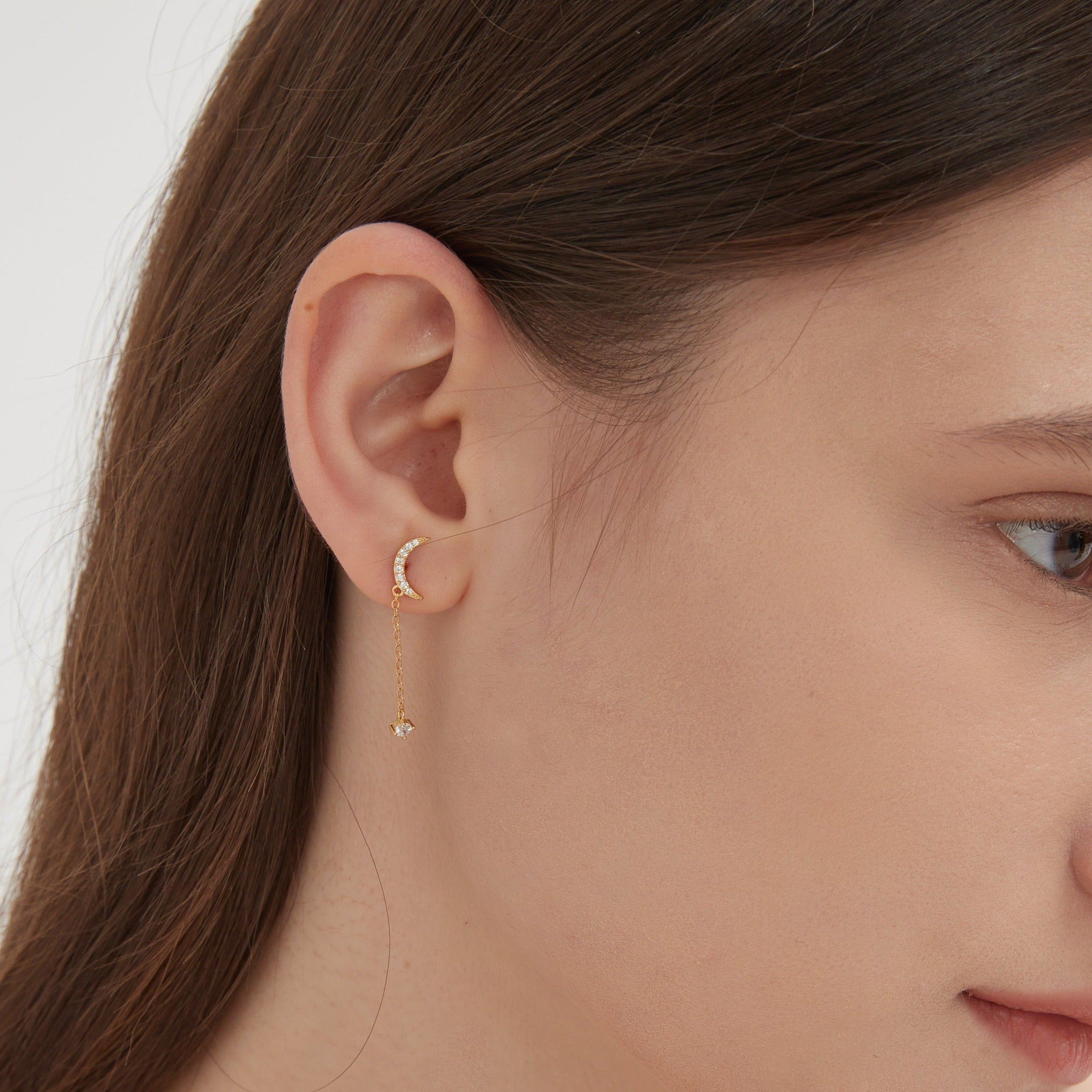 STMG Moon with Star Dangle Earrings in gold on ear